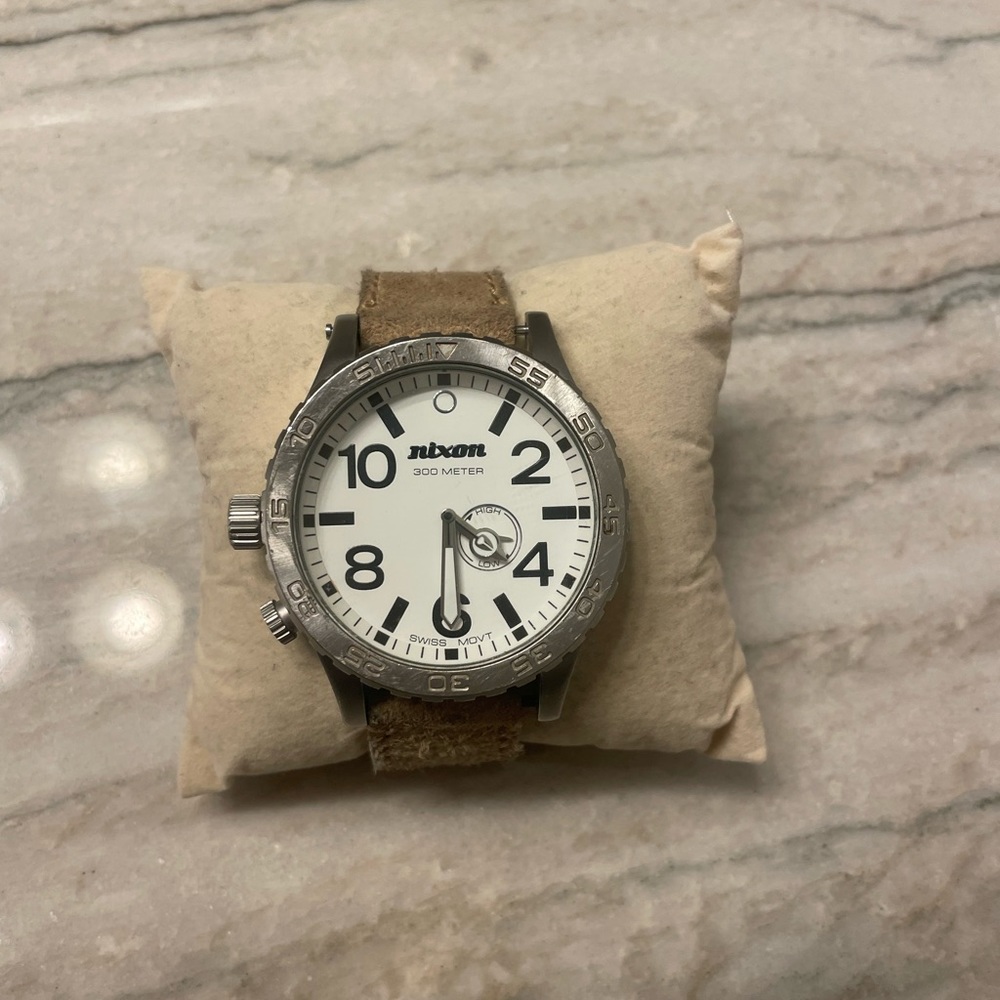Nixon 51-30 white face, beige tan band, good condition needs new battery, rare